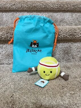Jellycat Yellow Plush Tennis Ball Toy with Brown Paws